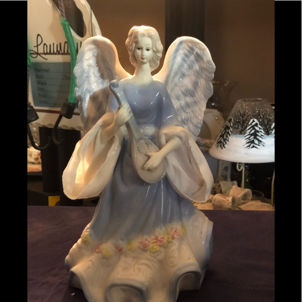 Porcelain Angel playing Banjo